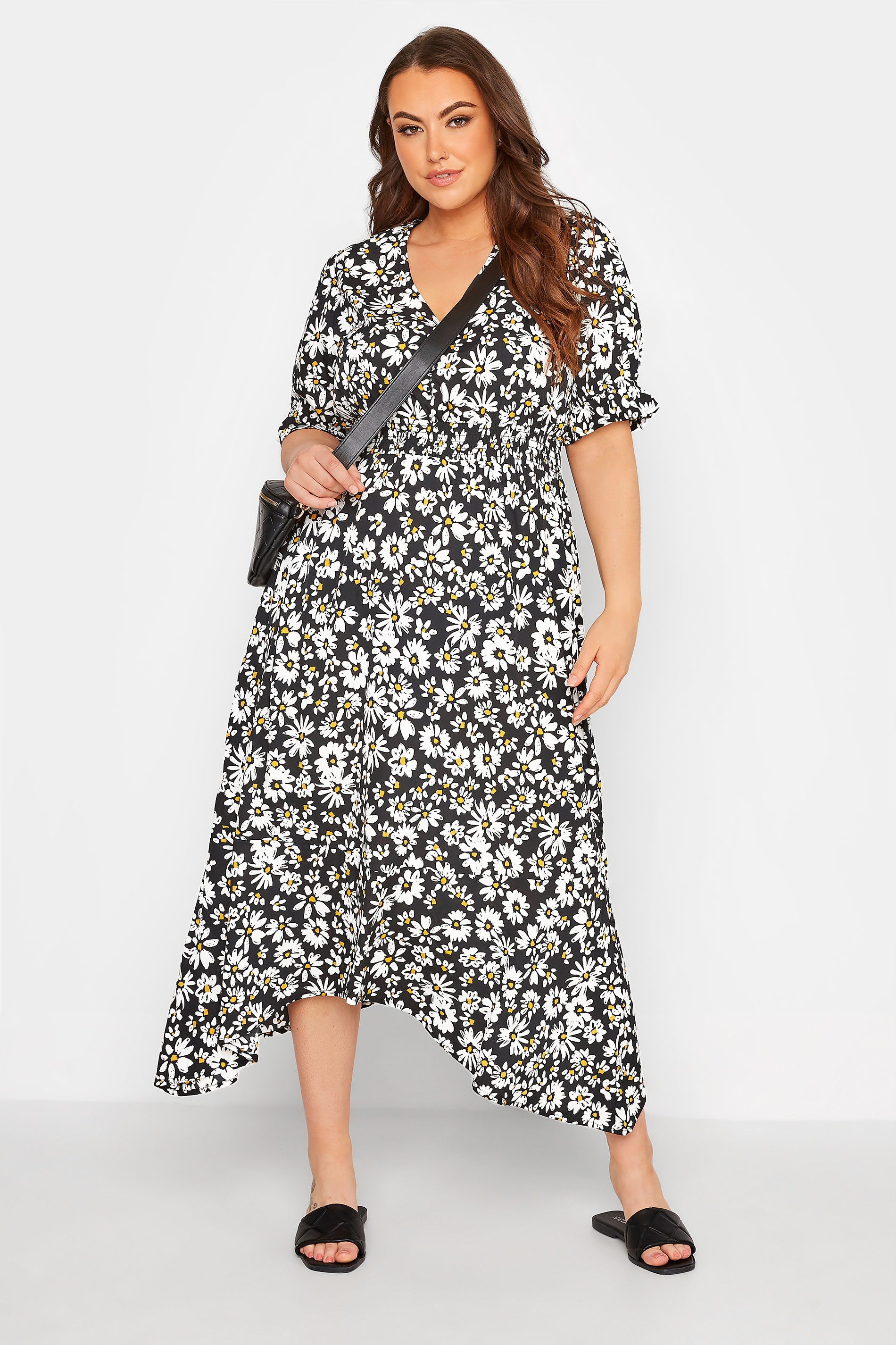 LIMITED COLLECTION Plus Size Black Daisy Print Hanky Hem Midi Dress | Yours Clothing 1