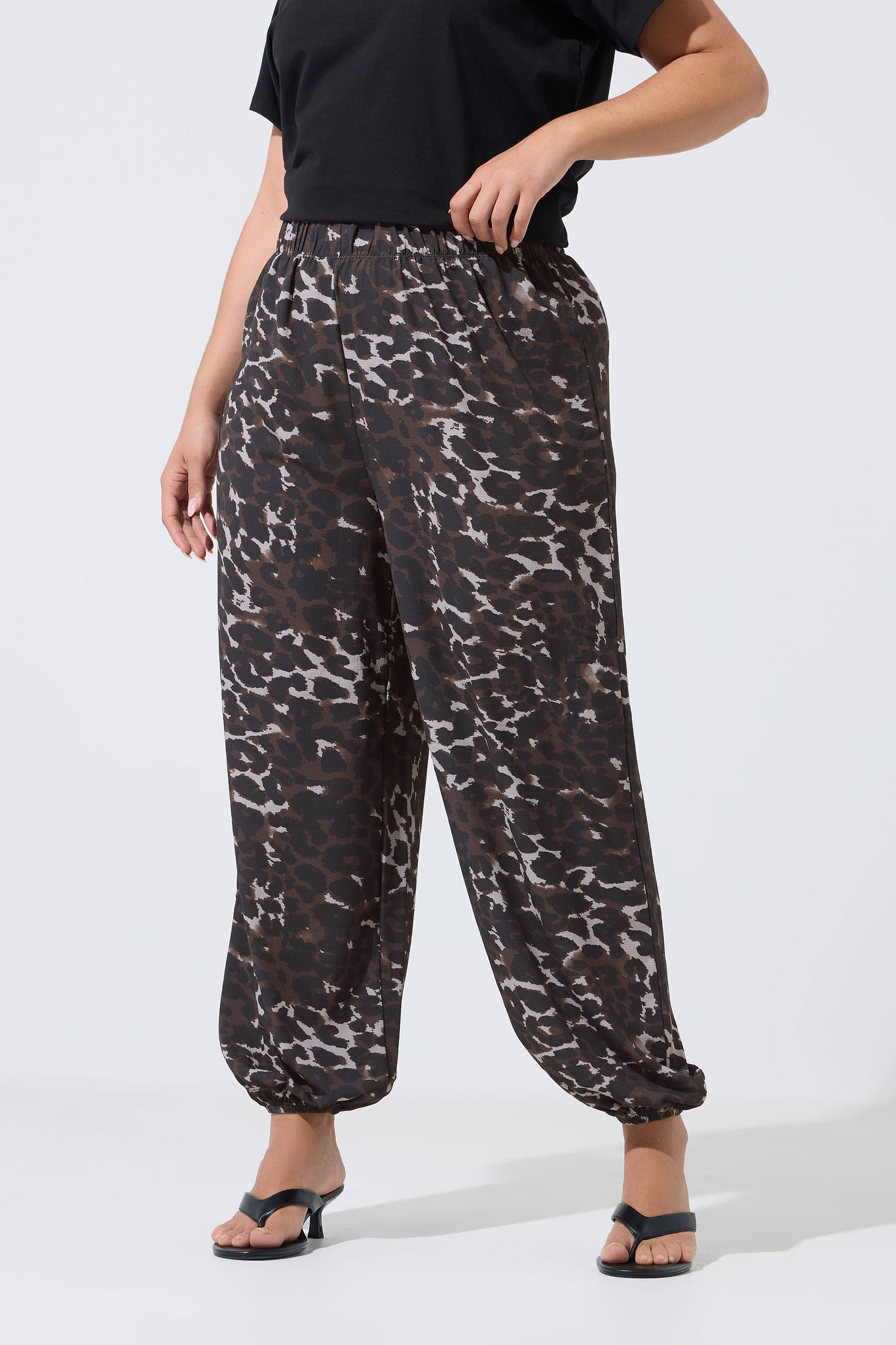 LIMITED COLLECTION Plus Size Brown leopard Balloon Trousers | Yours Clothing 1