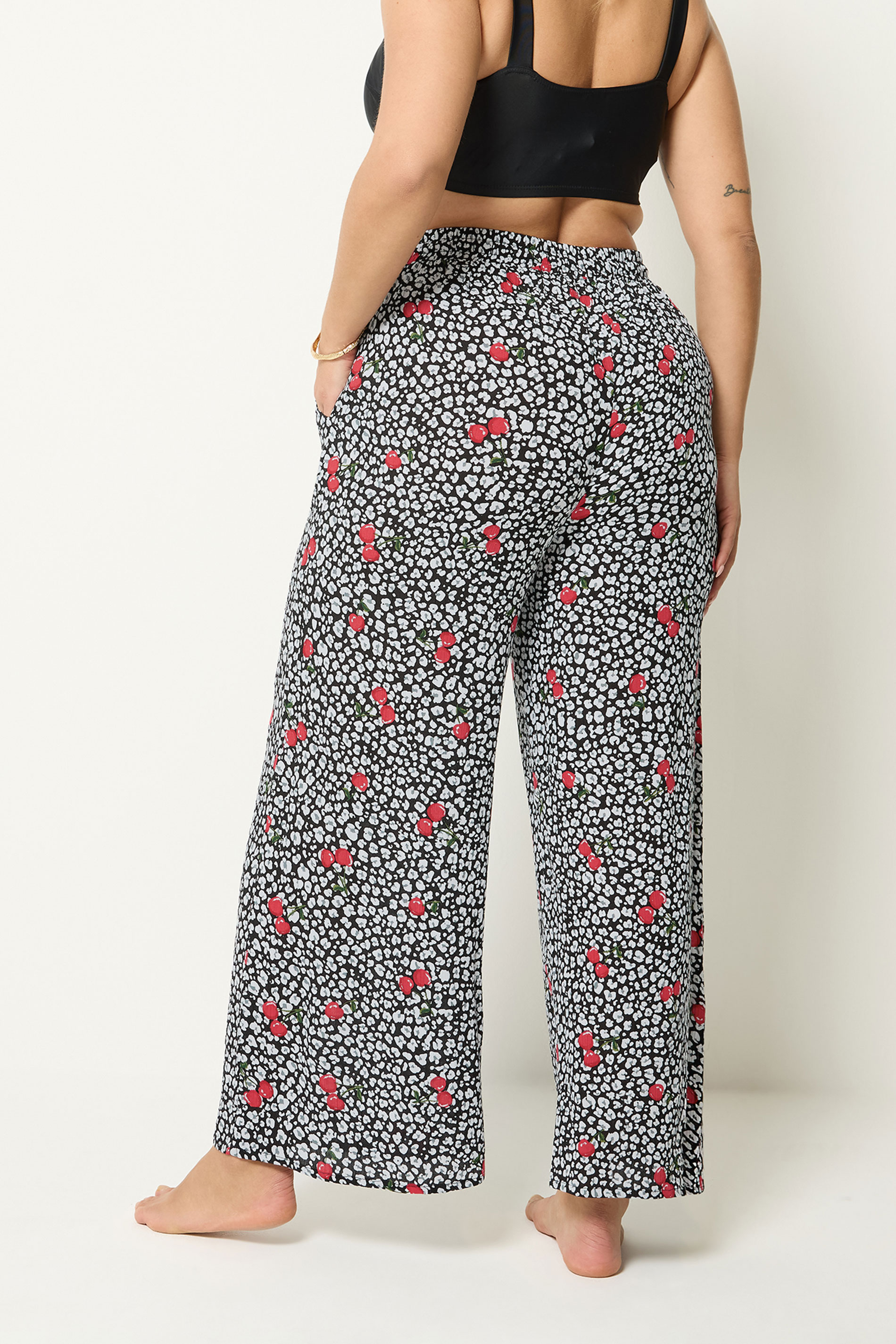 YOURS Plus Size Black Leopard & Cherry Print Crinkle Beachwear Wide Leg Trousers | Yours Clothing 2