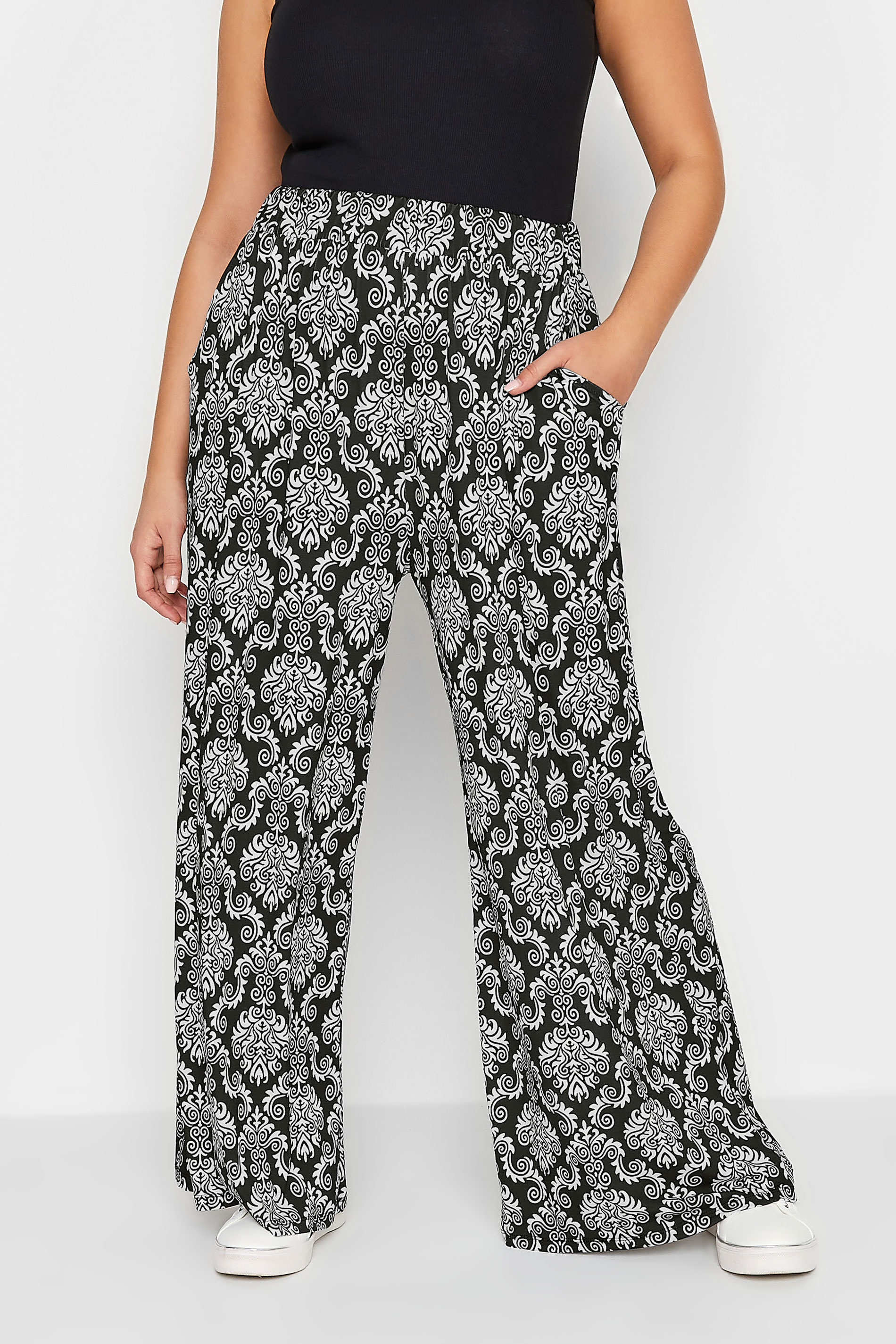 YOURS Plus Size Black Paisley Print Pull On Wide Leg Trousers | Yours Clothing 1