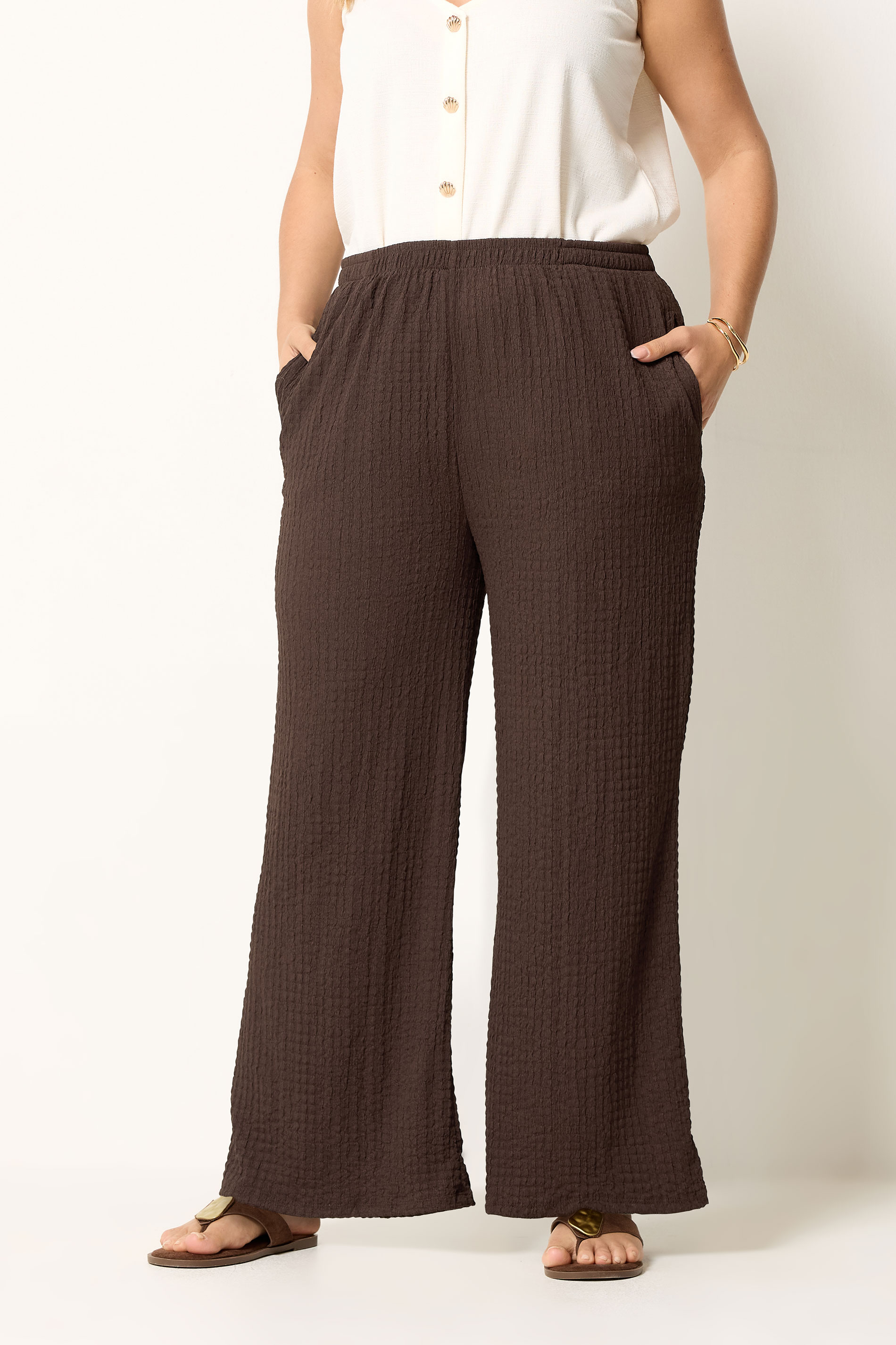 YOURS Plus Size Chocolate Brown Bubble Textured Wide Leg Trousers | Yours Clothing 1