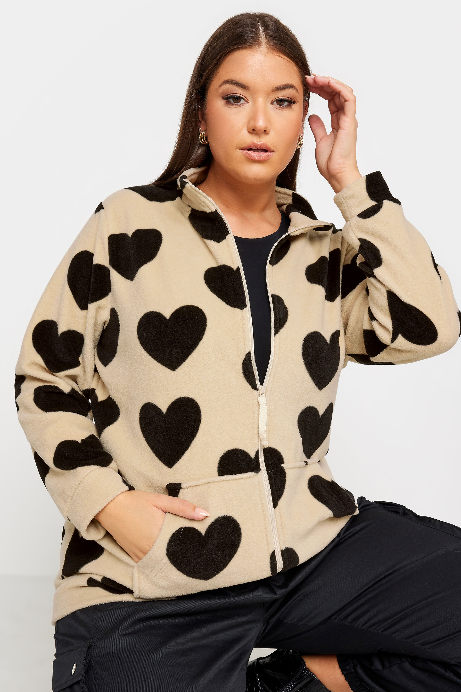 YOURS Plus Size Cream Heart Print Zip Through Fleece | Yours Clothing 1
