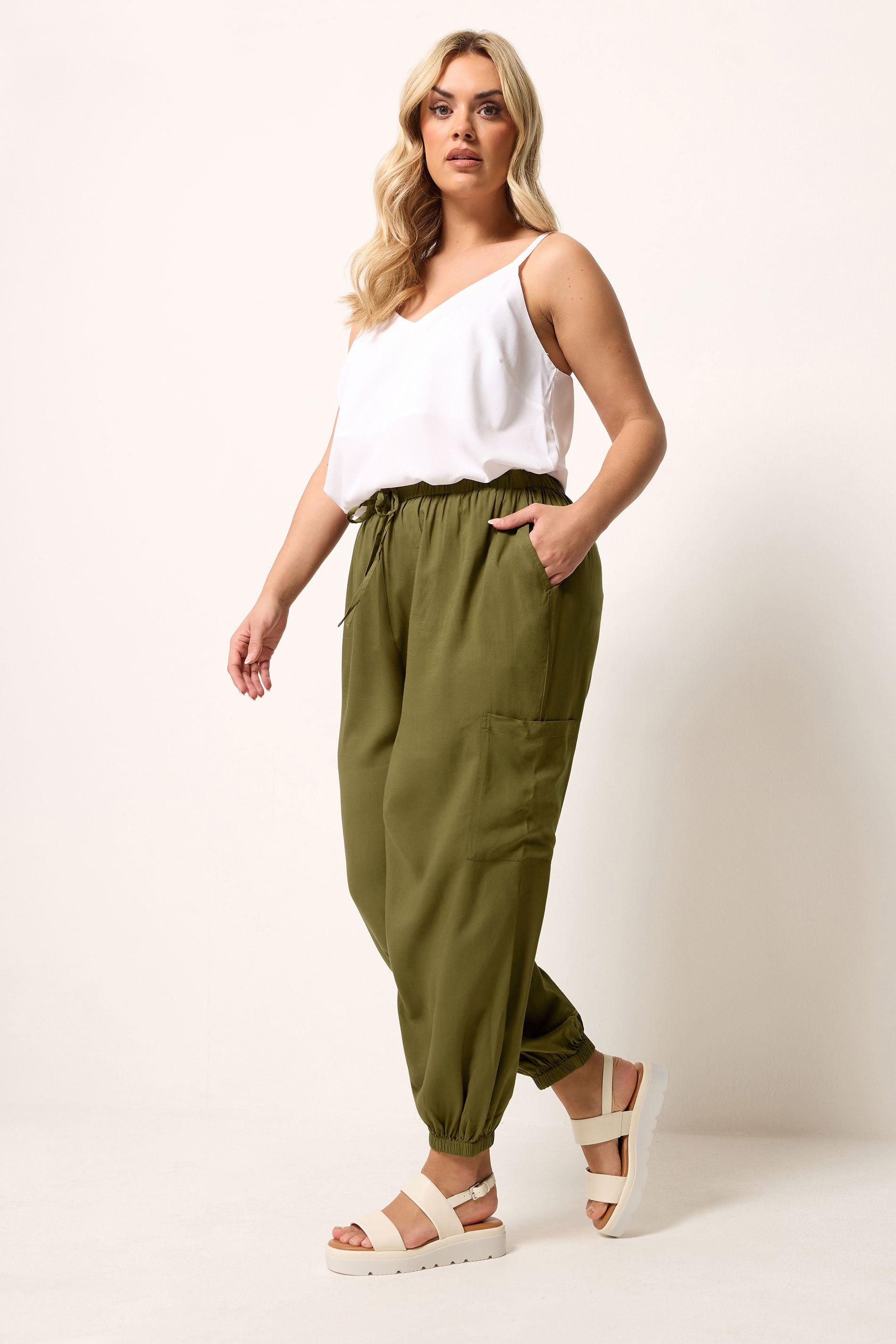 YOURS Plus Size Green Cargo Balloon Trousers | Yours Clothing 1