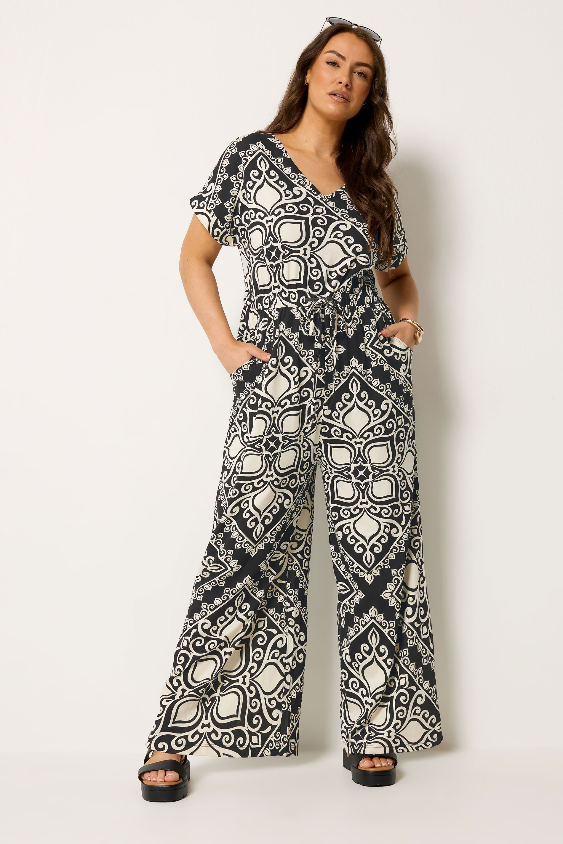 YOURS Plus Size Black & White Paisley Print Wide Leg Jumpsuit | Yours Clothing 1