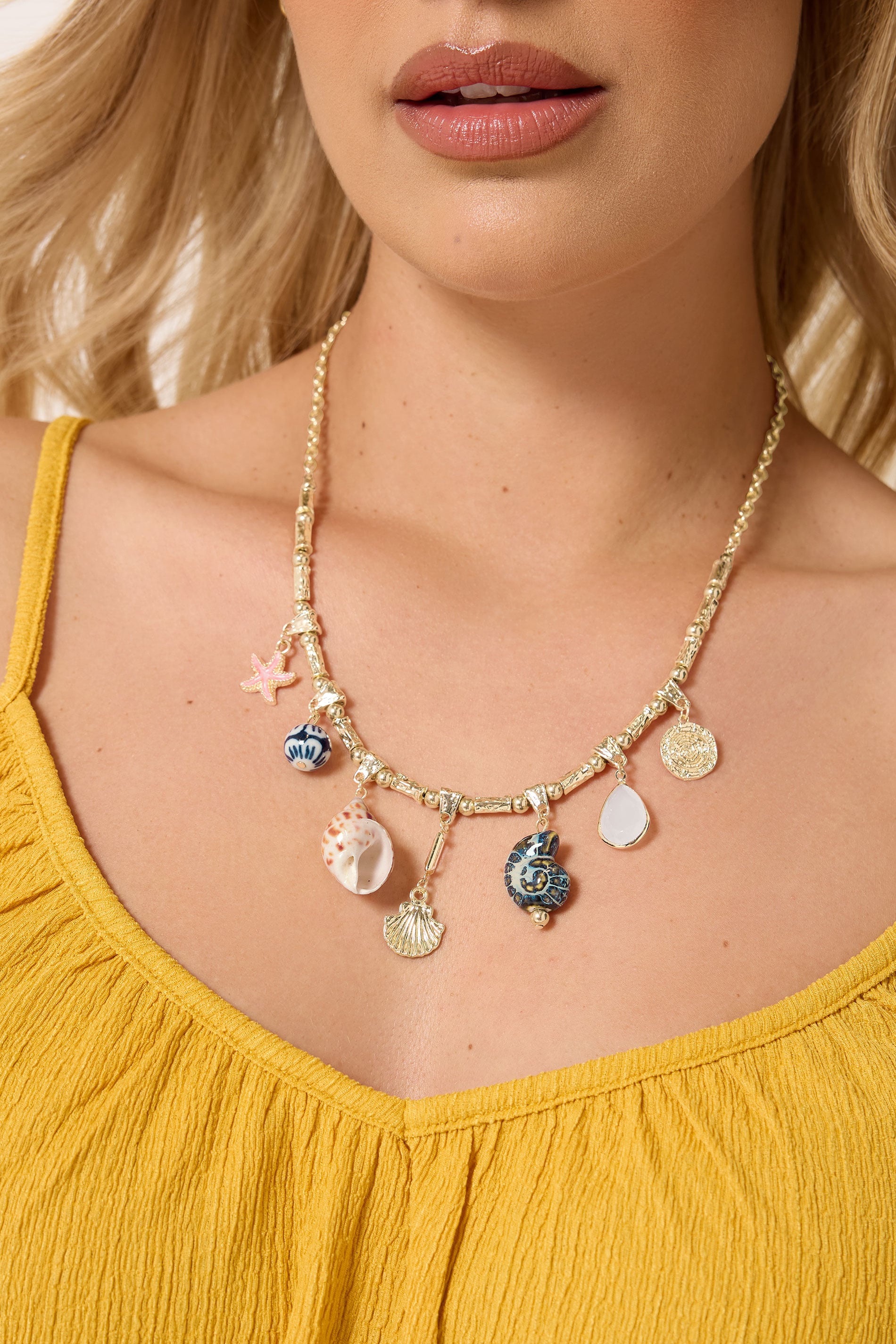 Gold Tone Shell Charm Statement Necklace | Yours Clothing 1