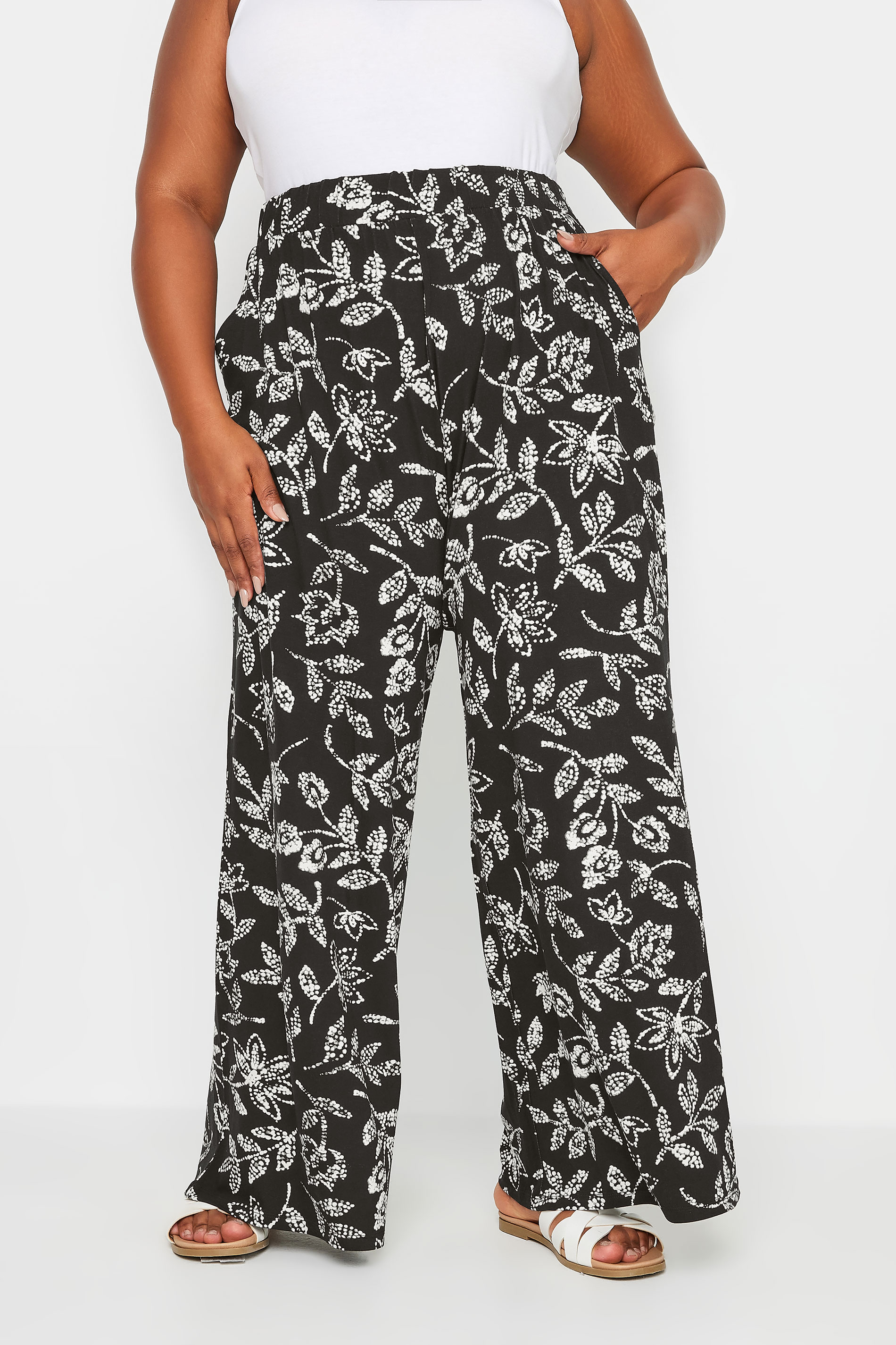 YOURS Plus Size Black Vine Print Wide Leg Jersey Trousers | Yours Clothing 1