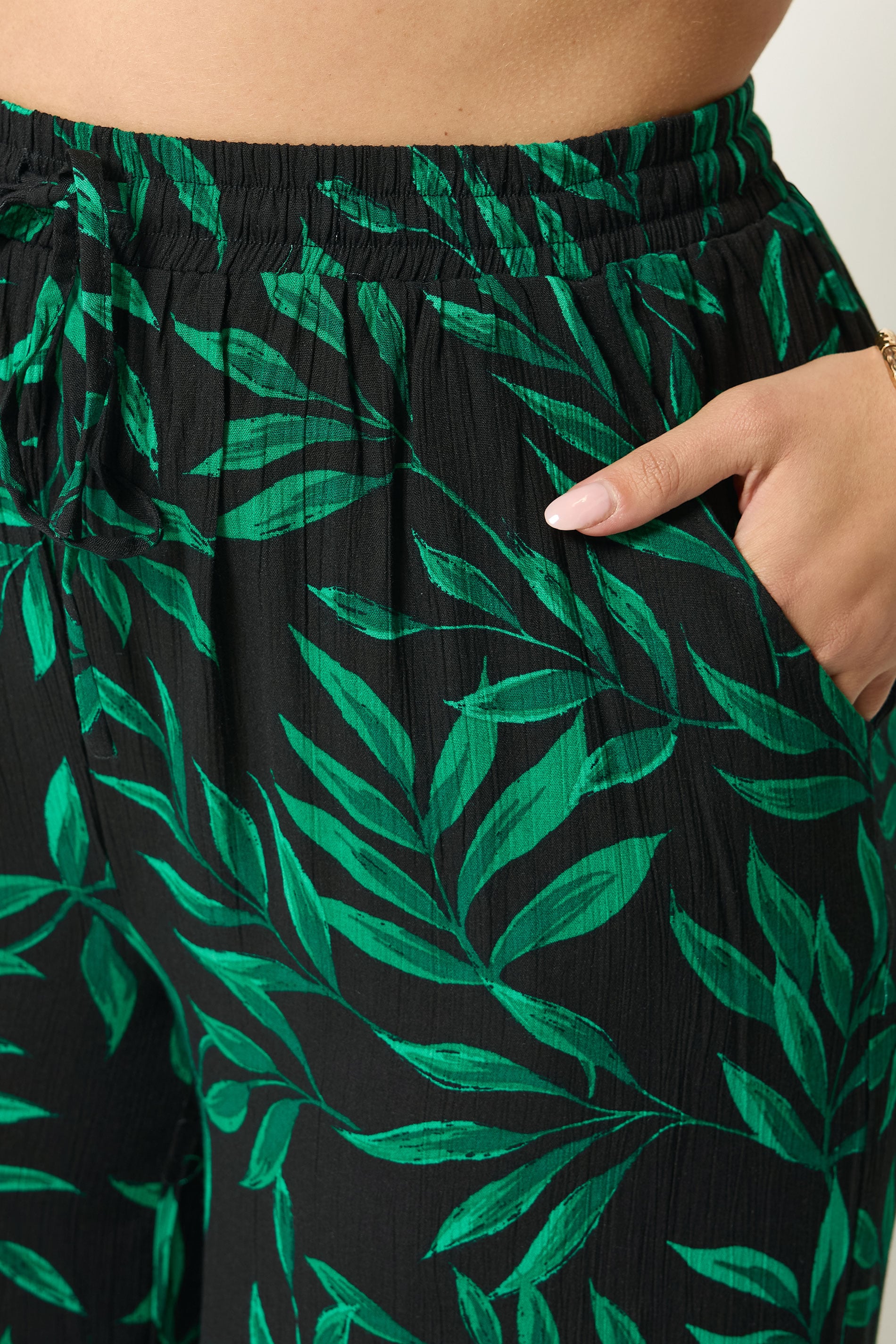 YOURS Plus Size Black & Green Leaf Print Crinkle Beachwear Wide Leg Trousers | Yours Clothing 4