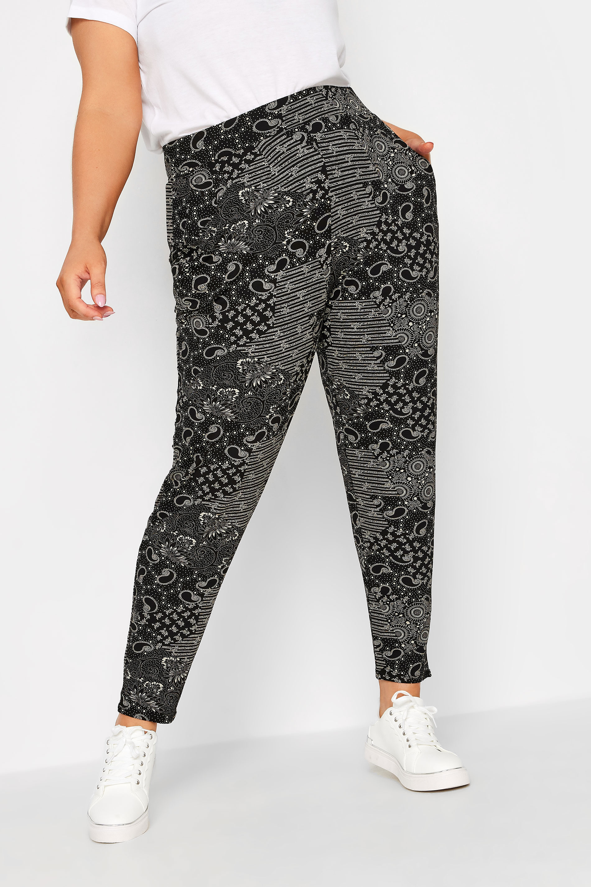 YOURS Plus Size Black Mixed Print Double Pleat Harem Trousers | Yours Clothing 1