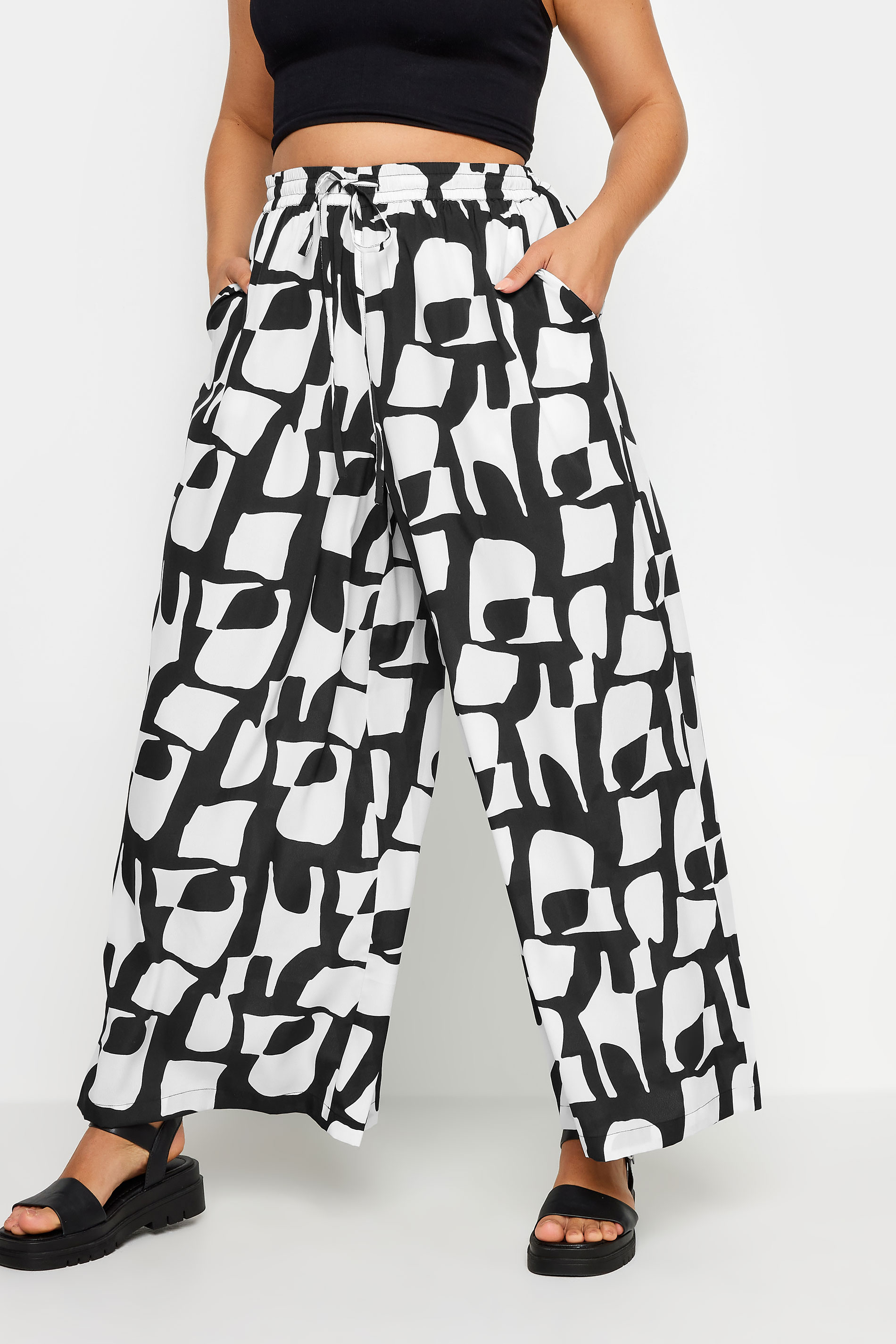 LIMITED COLLECTION Plus Size Black Abstract Print Drawstring Wide Leg Trousers | Yours Clothing 1