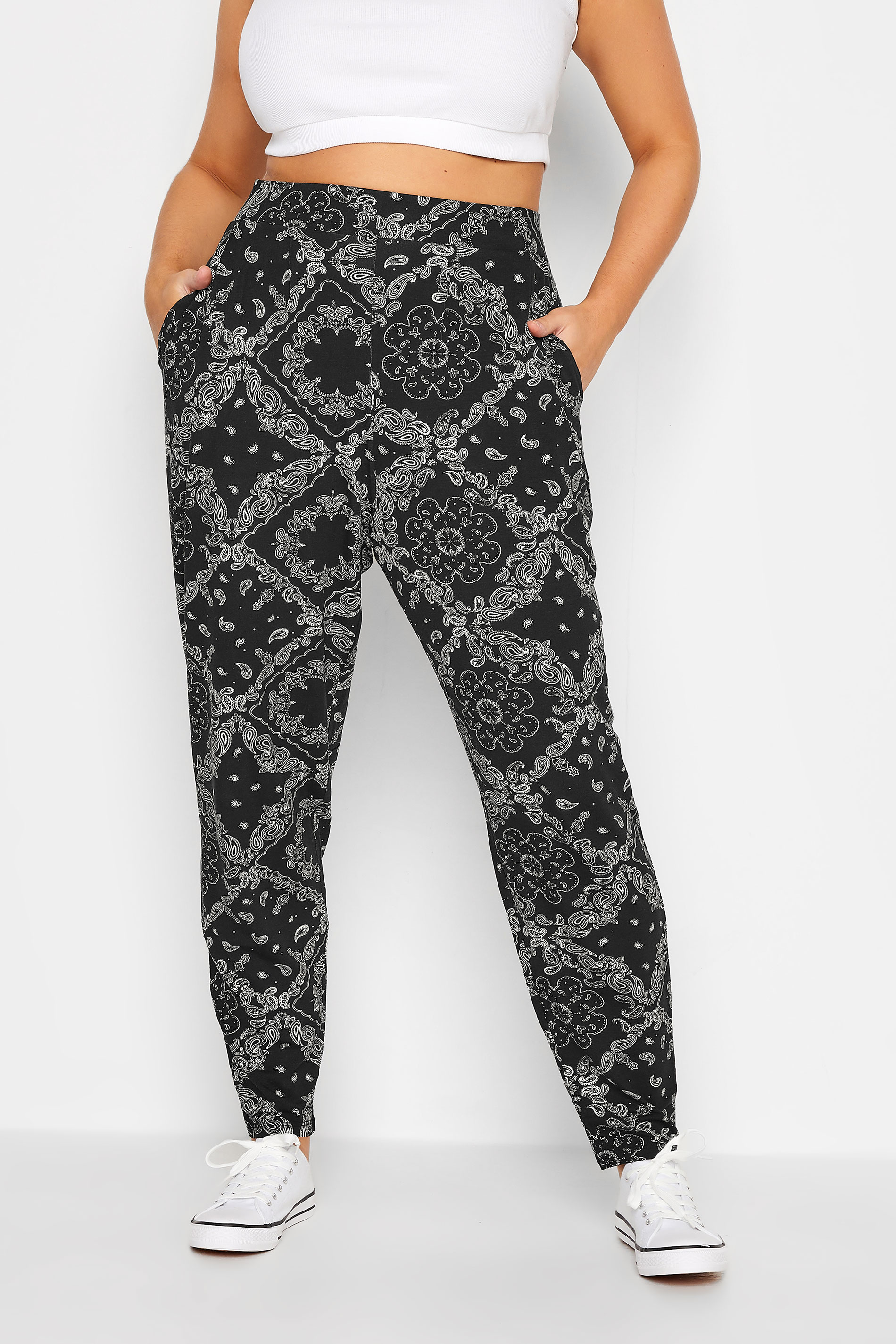 YOURS Plus Size Black Paisley Print Double Pleat Harem Trousers | Yours Clothing 1