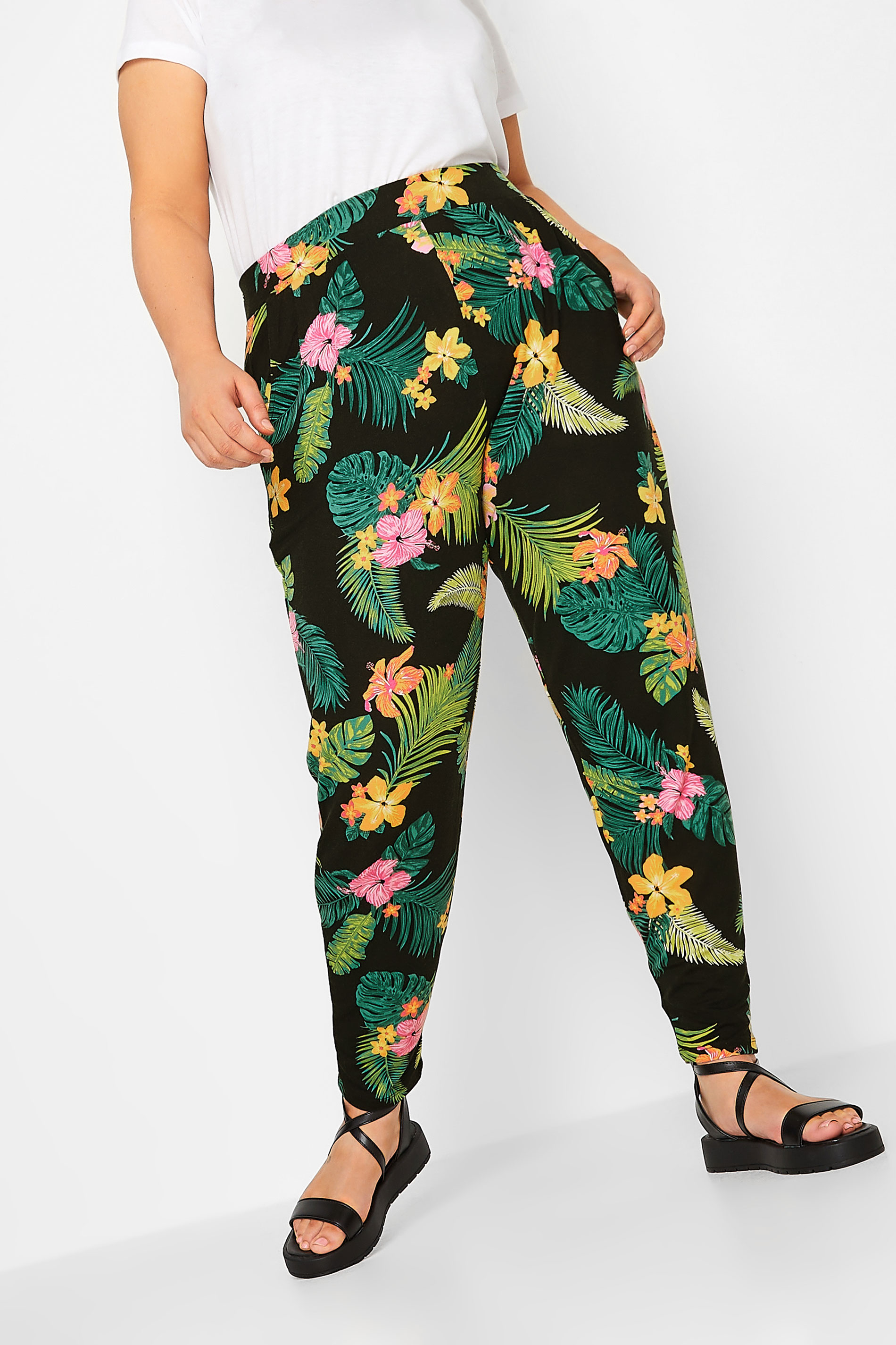 YOURS Plus Size Black Tropical Print Double Pleat Harem Trousers | Yours Clothing 1