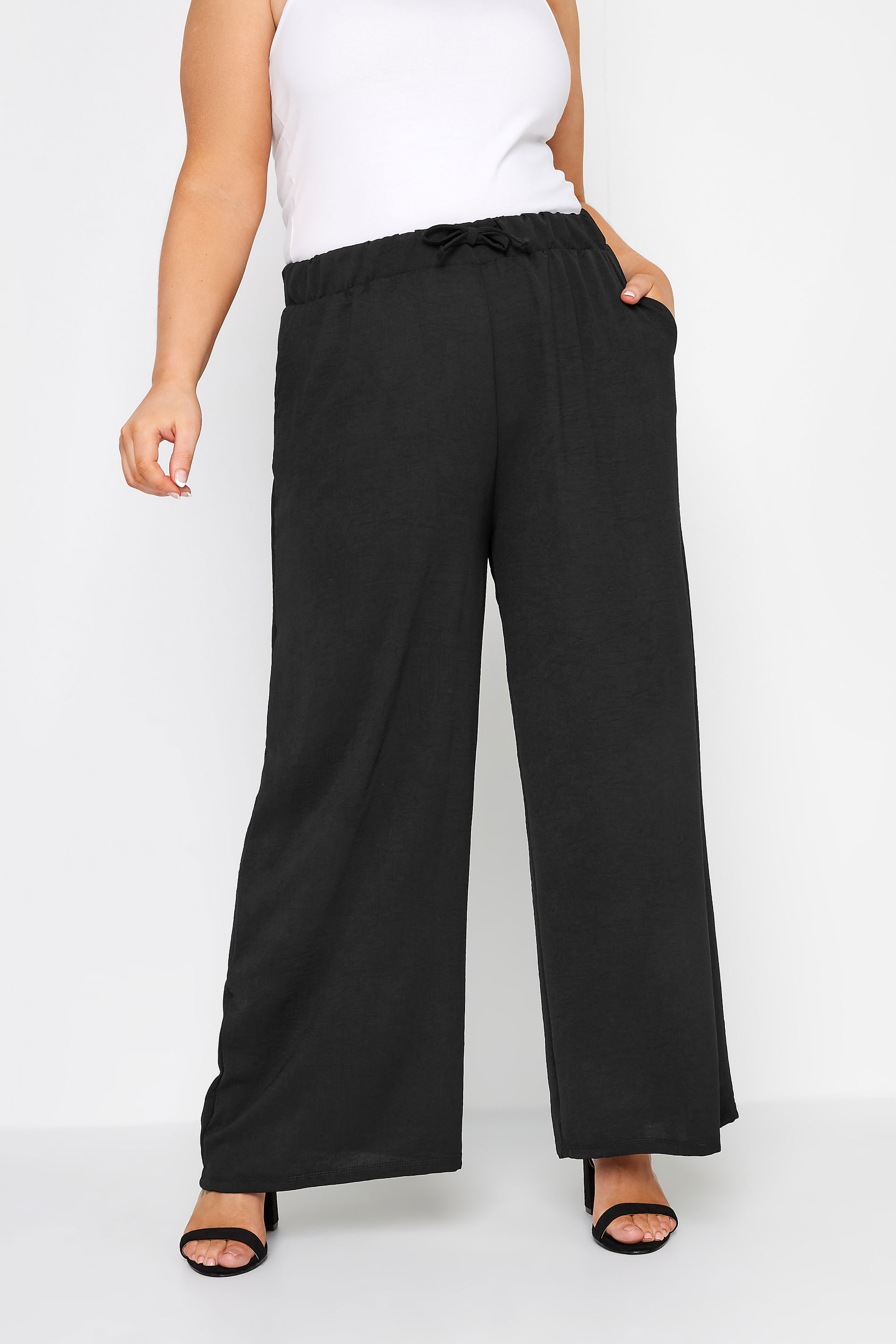 YOURS Plus Size Black Stretch Jersey Wide Leg Trousers | Yours Clothing 1