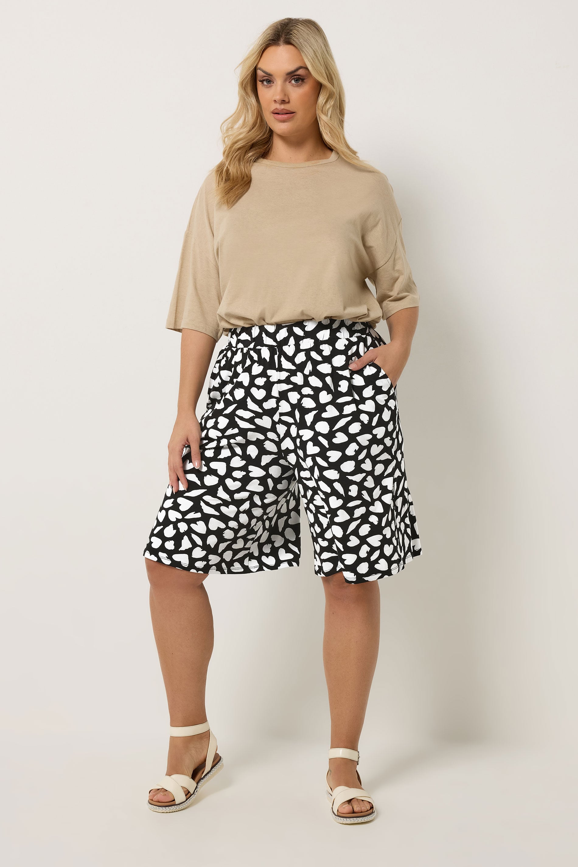 YOURS Plus Size Black Heart Print Shorts | Yours Clothing 1