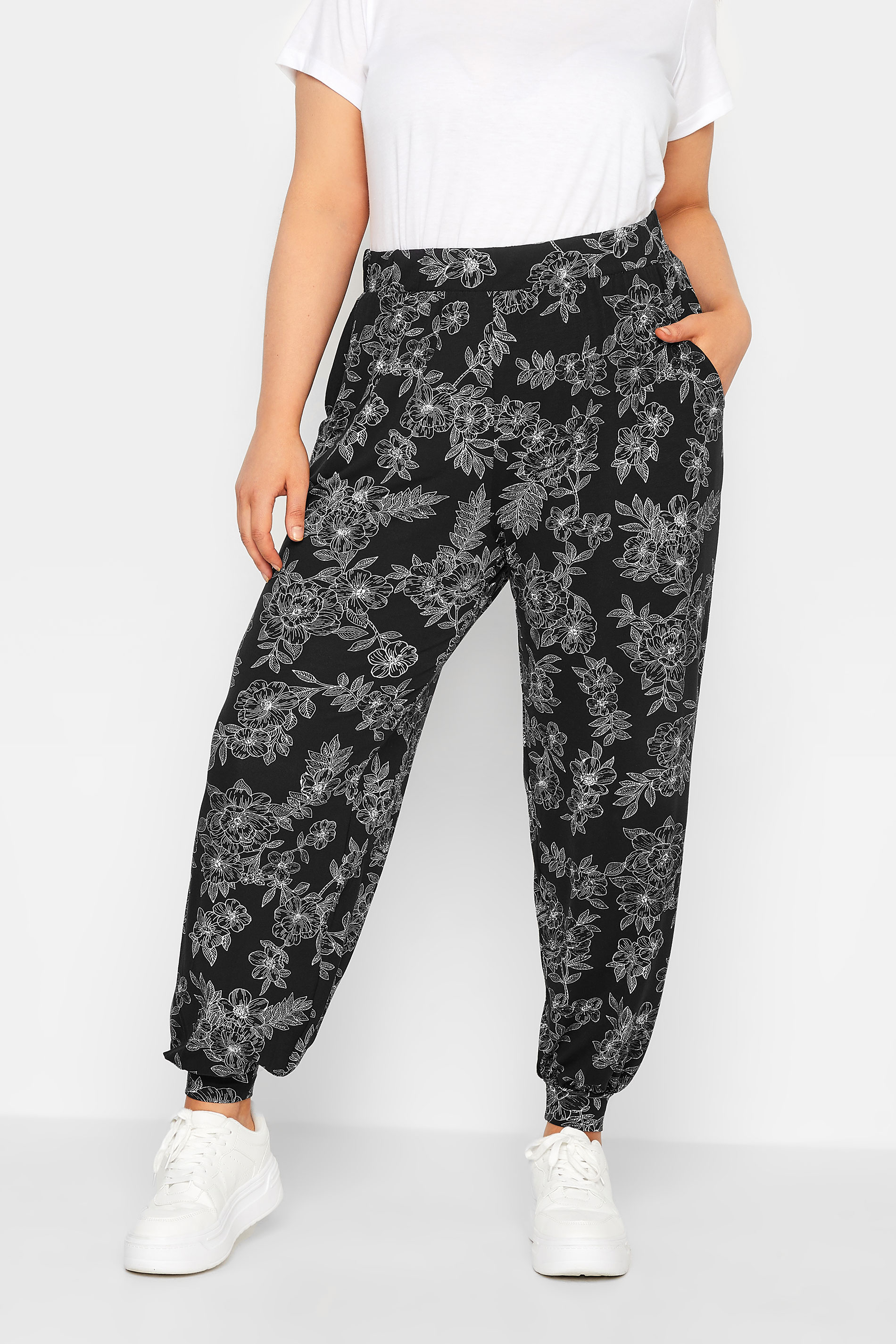YOURS Plus Size Curve Black Cuffed Floral Harem Joggers | Yours Clothing 1