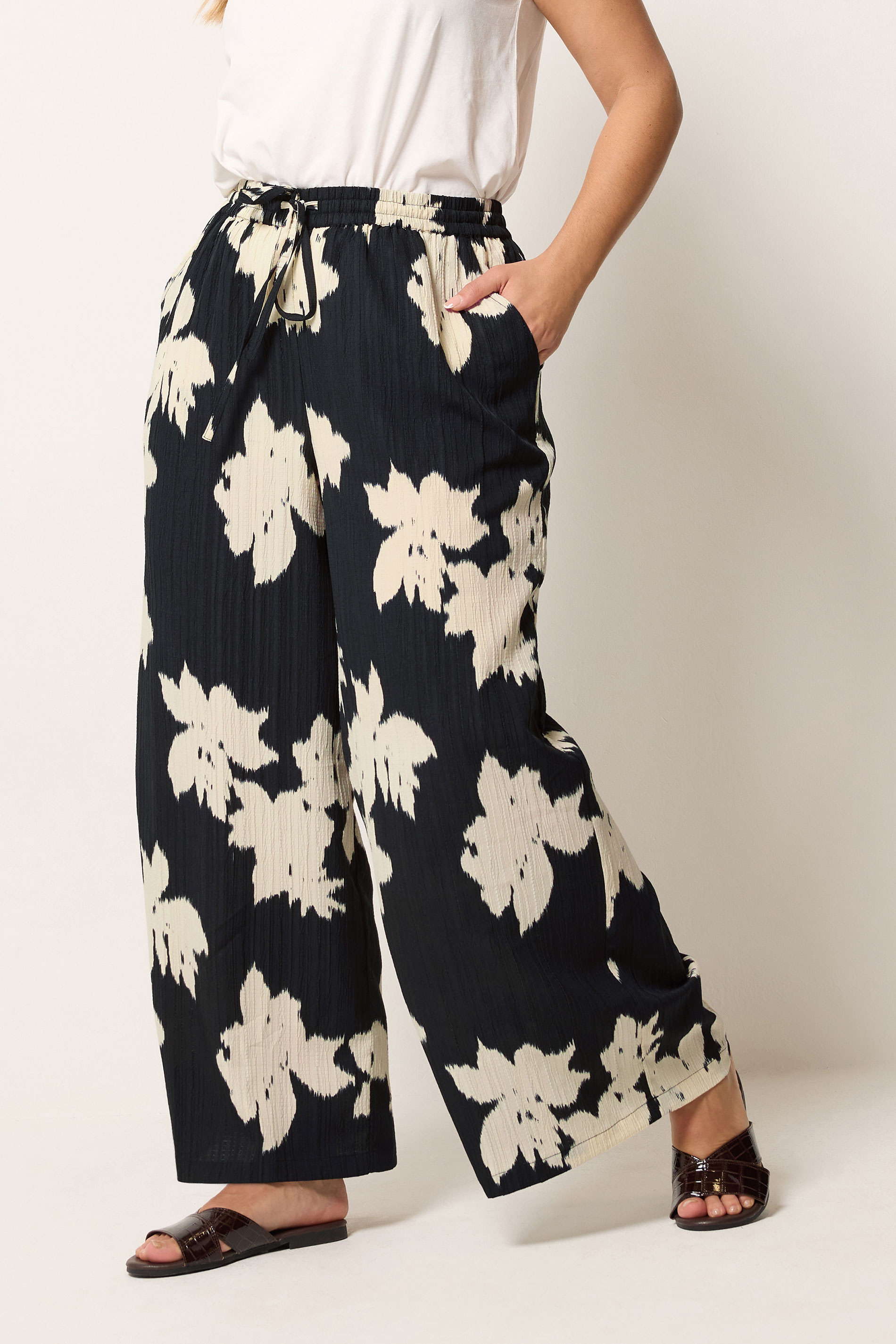 YOURS Plus Size Black Floral Textured Wide Leg Trousers | Yours Clothing 1