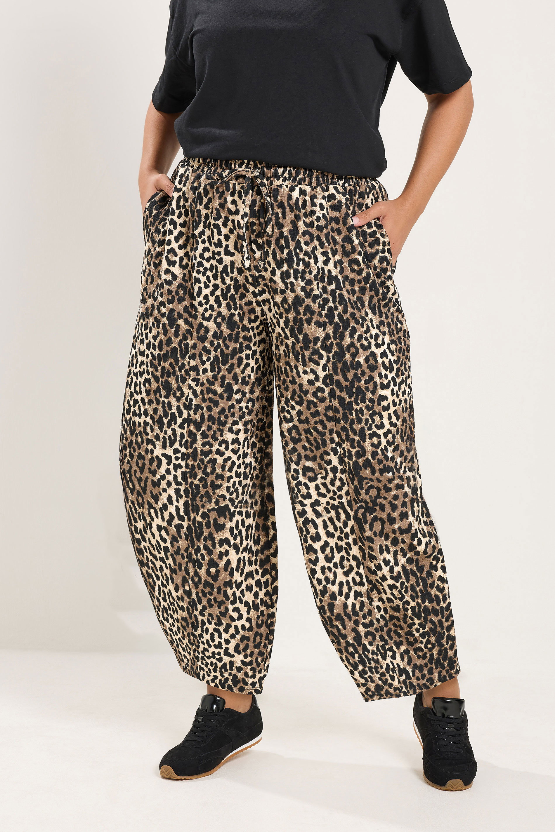 YOURS Plus Size Black Leopard Print Crinkle Barrel Trousers | Yours Clothing 1