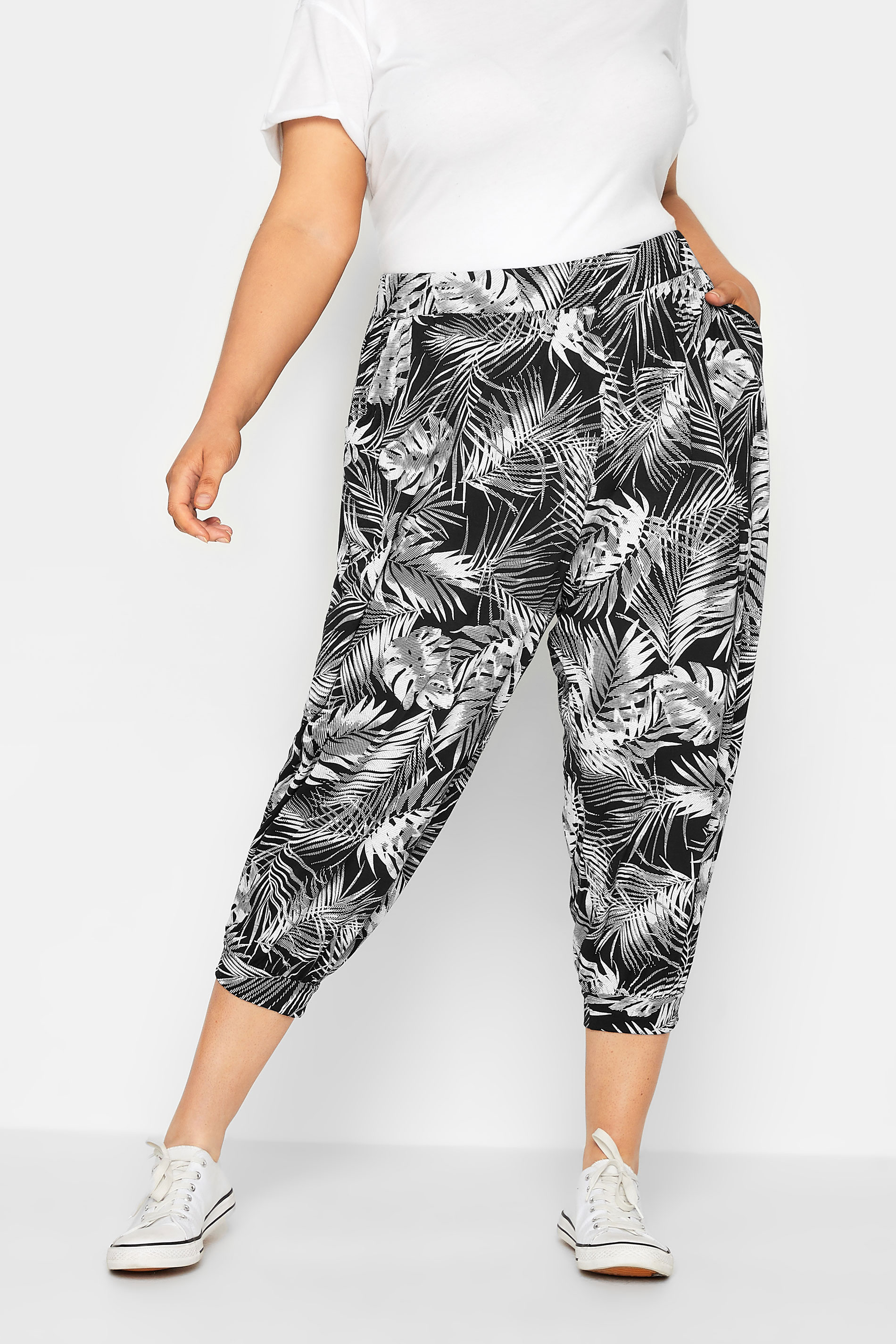 YOURS Curve Plus Size Black Leaf Print Cropped Harem Trousers | Yours Clothing  1