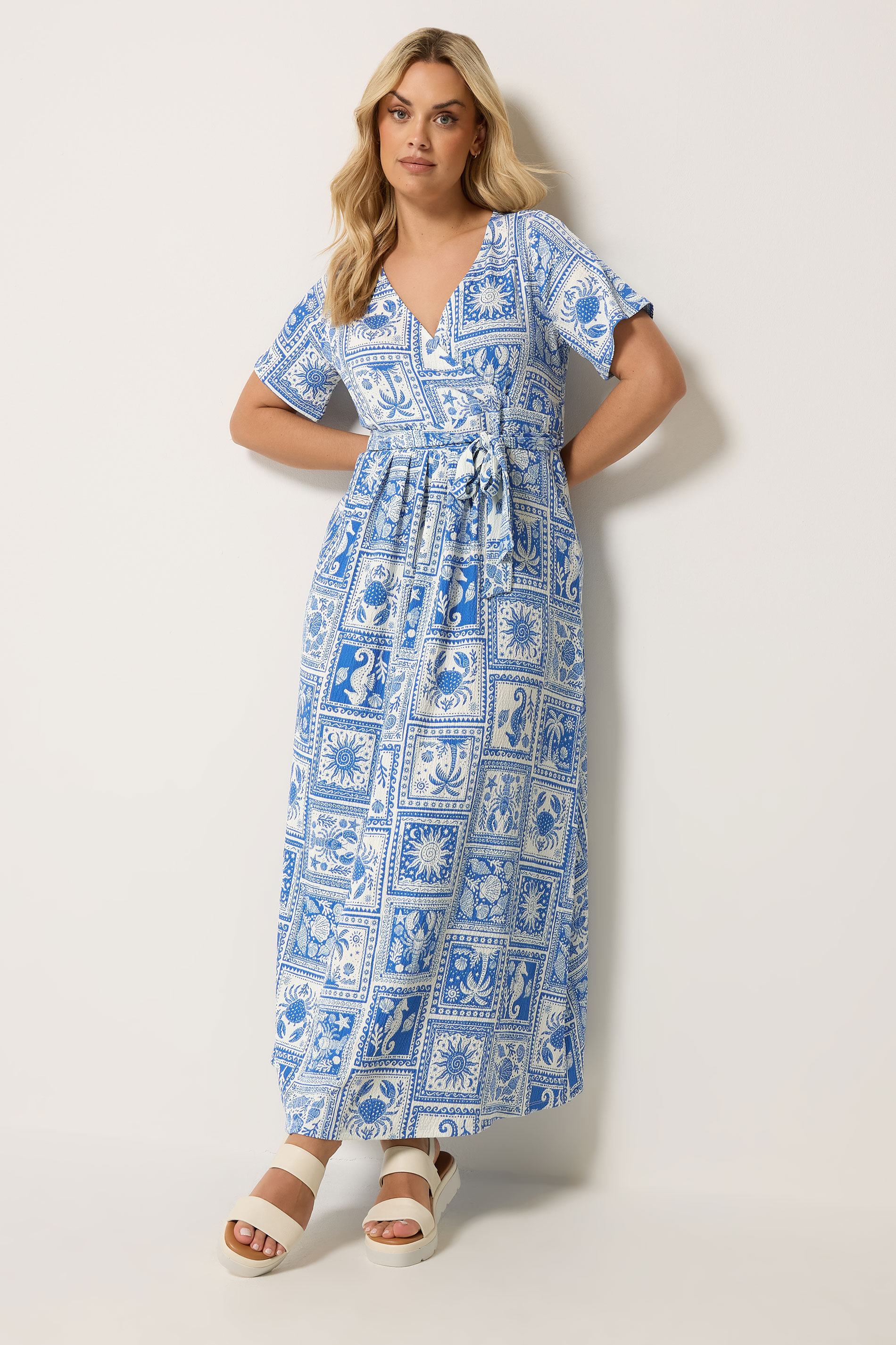 YOURS Plus Size Blue Mixed Palm Tree Wrap Front Dress | Yours Clothing 1