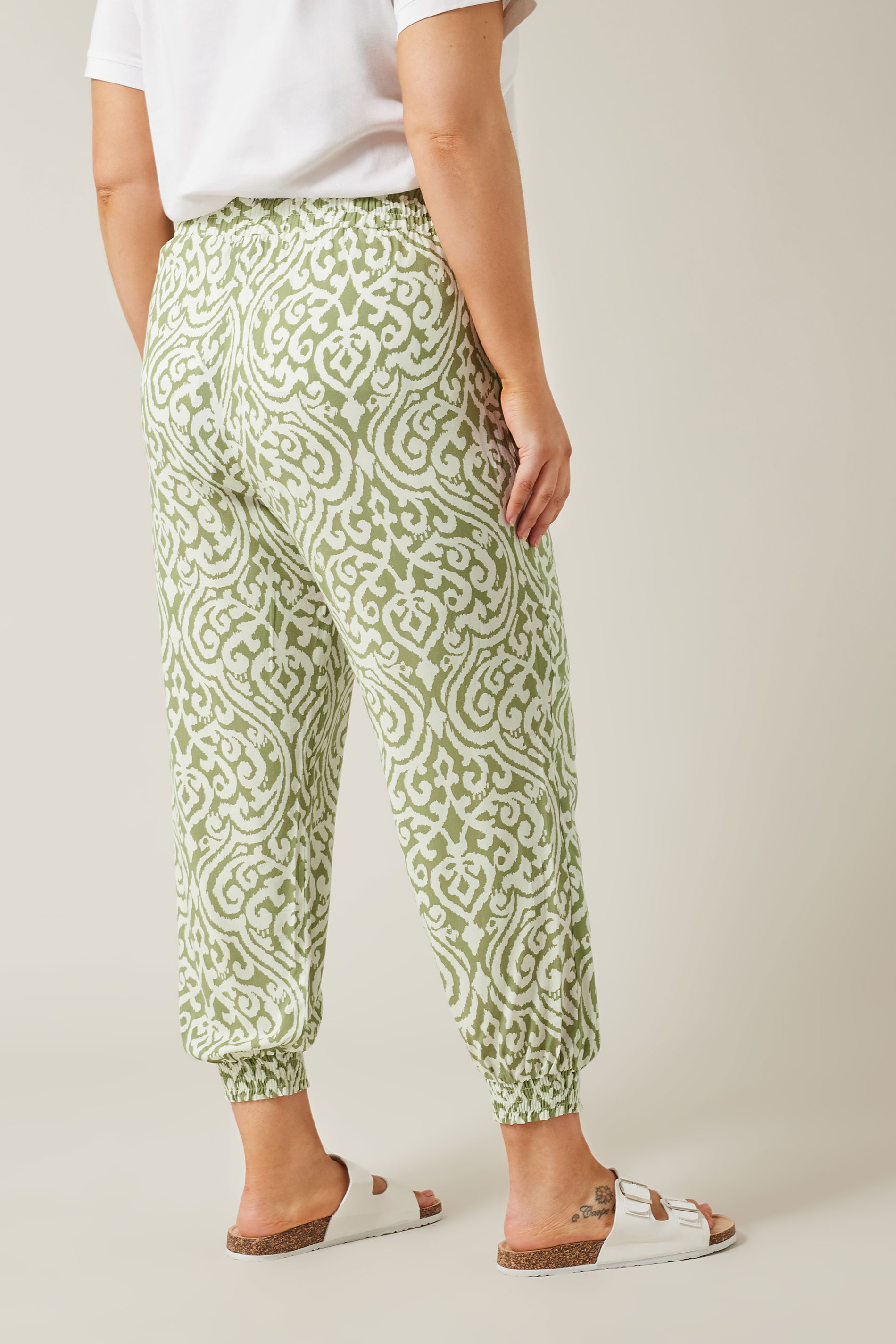 EVANS Plus Size Green Ikat Print Cuffed Harem Trousers | Evans  2