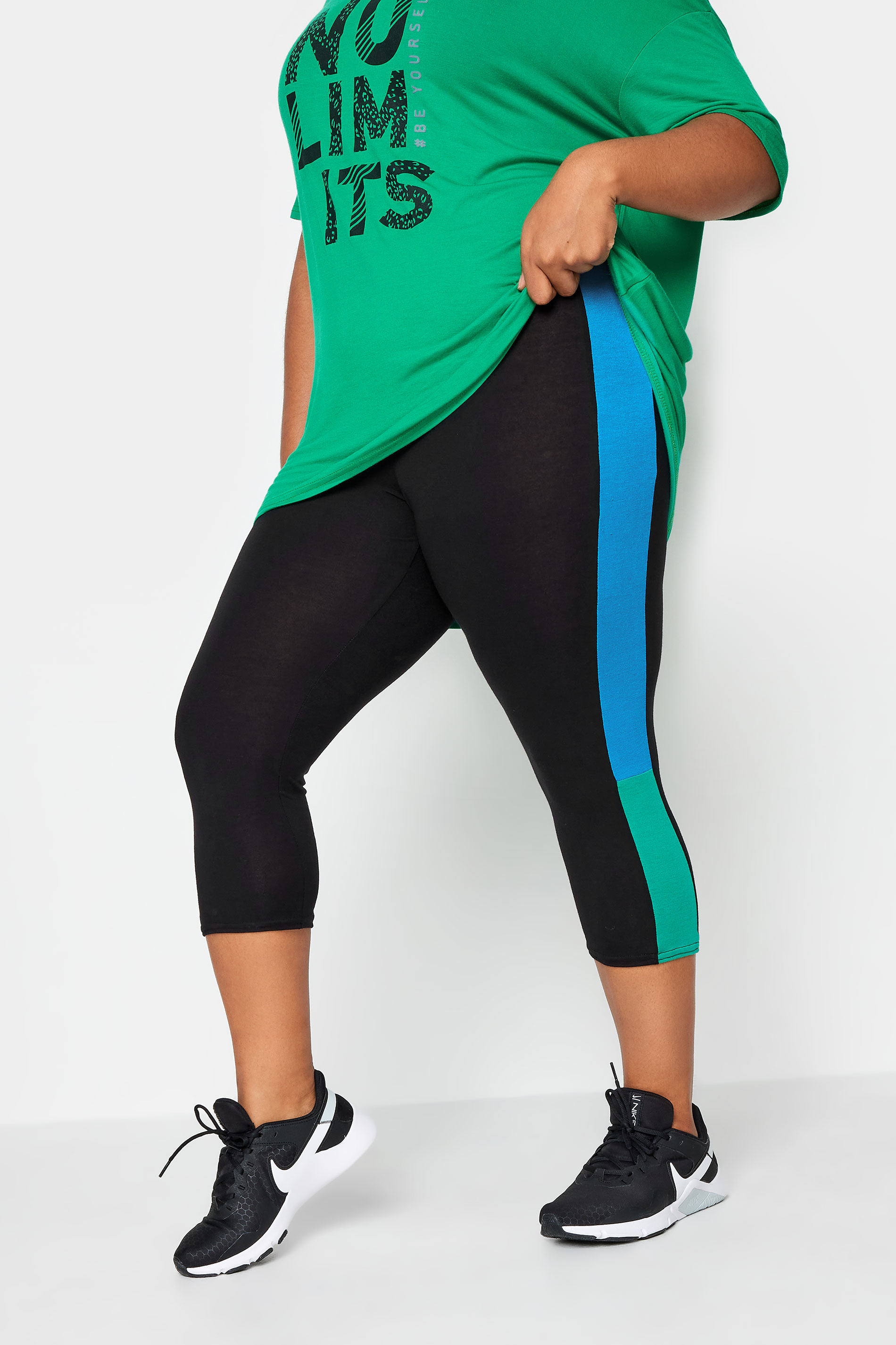YOURS ACTIVE Plus Size Black & Blue Side Stripe Cropped Leggings | Yours Clothing 1