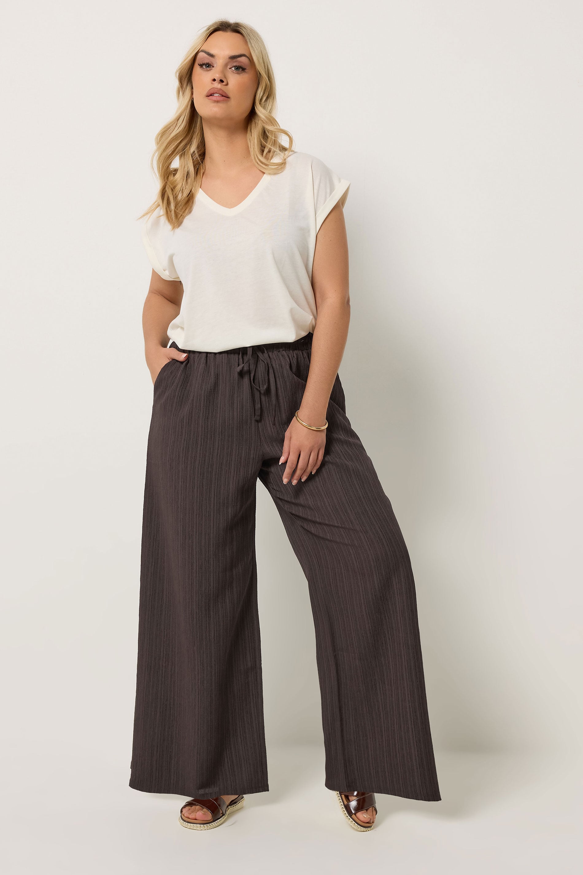 YOURS Plus Size Brown Wide Leg Textured Trousers | Yours Clothing 1
