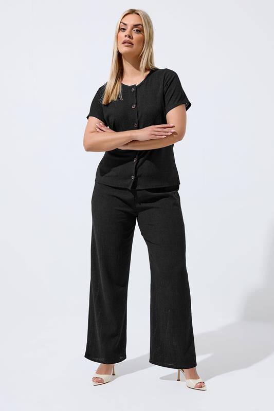 LIMITED COLLECTION Plus Size Black Crinkle Wide Leg Trousers | Yours Clothing 1