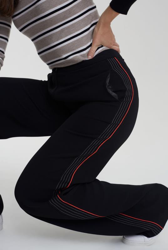 black wide leg trousers with side stripe