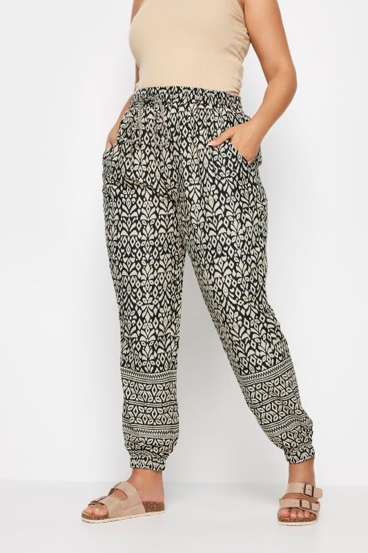 YOURS Plus Size Black Ikat Print Joggers | Yours Clothing 1