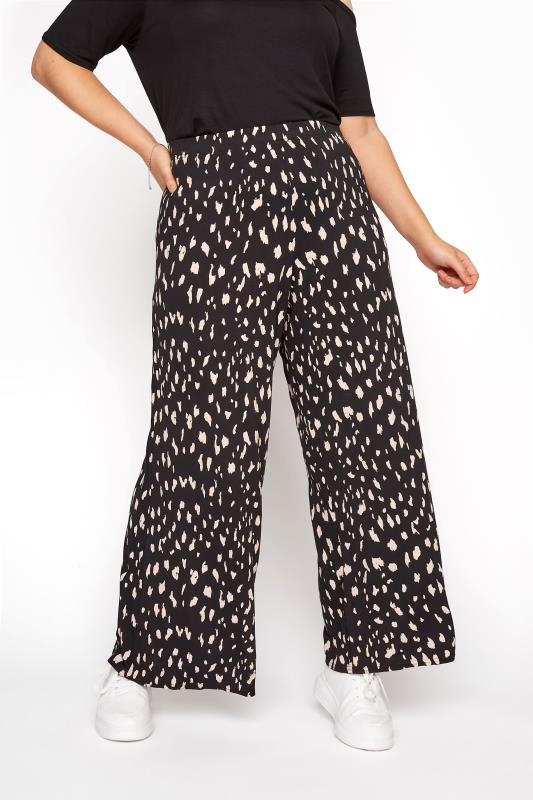 LIMITED COLLECTION Black Animal Marking Wide Leg Trousers | Yours Clothing 1