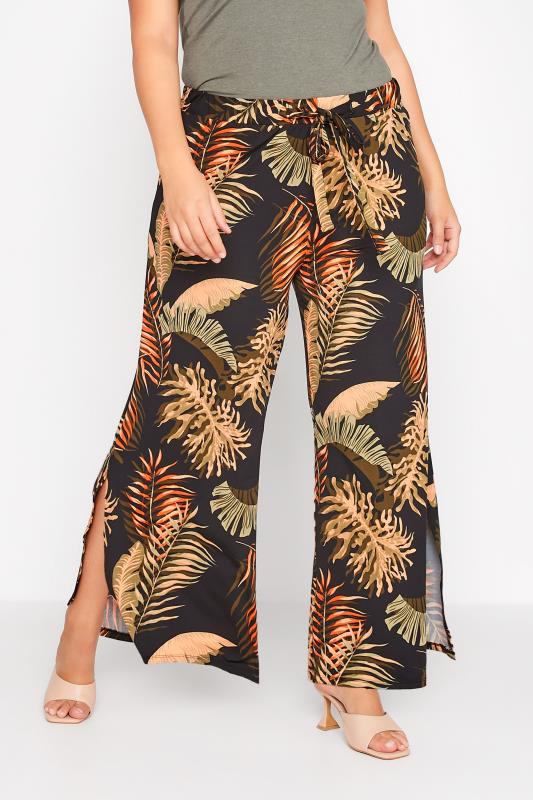 Plus Size Black Tropical Print Tie Wide Leg Trousers | Yours Clothing 1