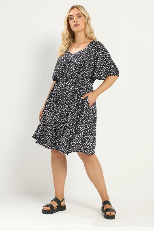 YOURS Plus Size Black Daisy Floral Smock Mini Dress | Yours Clothing 1