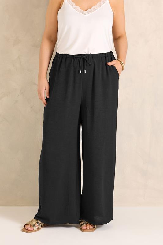 EVANS Plus Size Black Tie Waist Wide Leg Trousers | Evans  1
