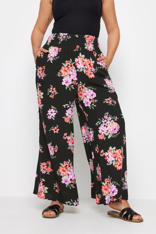 YOURS Plus Size Black Floral Bloom Print Shirred Wide Leg Trousers | Yours Clothing 1