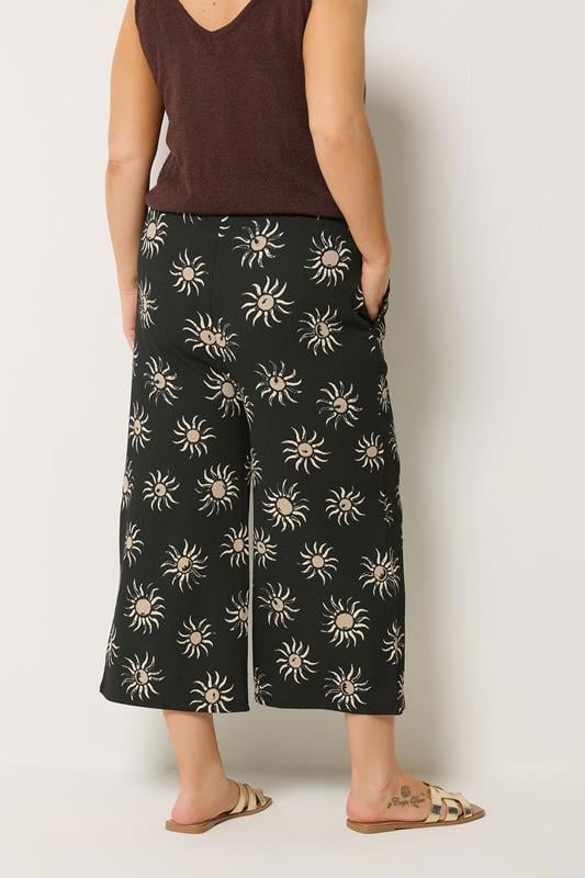 YOURS Plus Size Black Sun Print Cropped Wide Leg Trousers | Yours Clothing 2