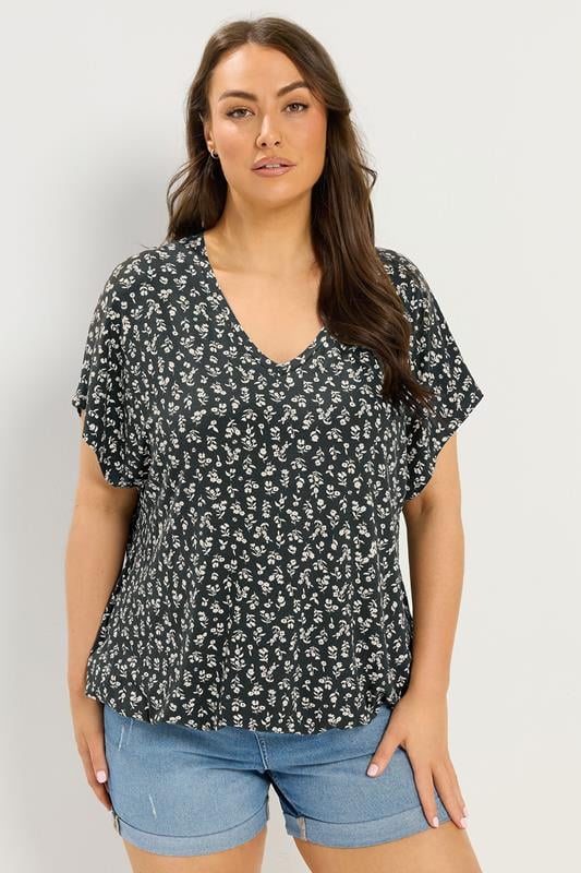  YOURS camiseta negra con estampado floral y bajo elástico