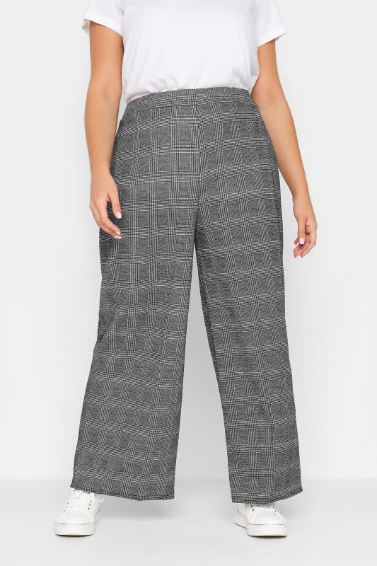 YOURS PETITE Plus Size Black Dogtooth Check Stretch Wide Leg Trousers | Yours Clothing 1