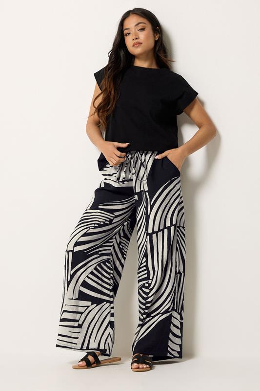 PixieGirl Petite Women's Black Swirl Print Beaded Wide Leg Trousers | PixieGirl 1