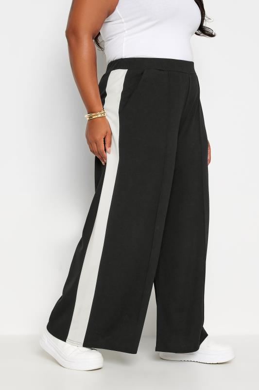 YOURS Plus Size Black Side Stripe Wide Leg Trousers | Yours Clothing 1
