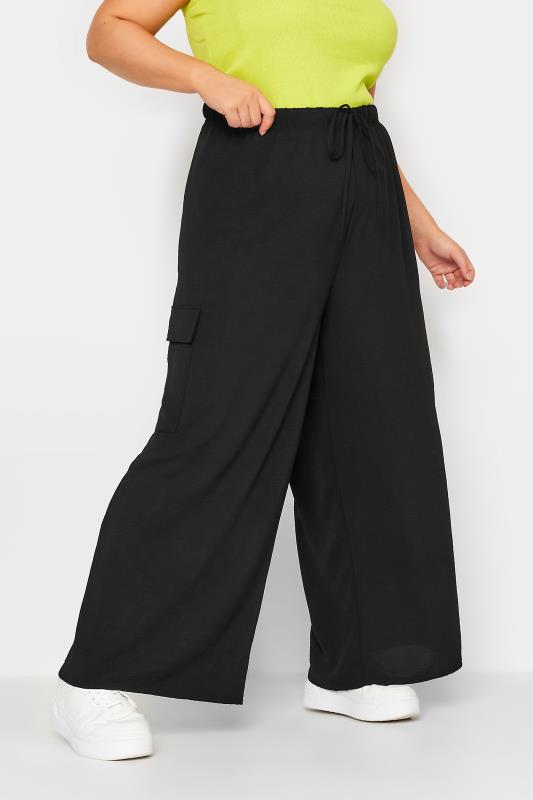 YOURS Plus Size Black Wide Leg Crepe Cargo Trousers | Yours Clothing 1