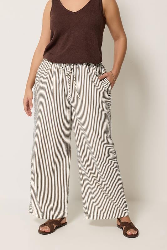 YOURS Plus Size Chocolate Brown Stripe Trousers | Yours Clothing 1