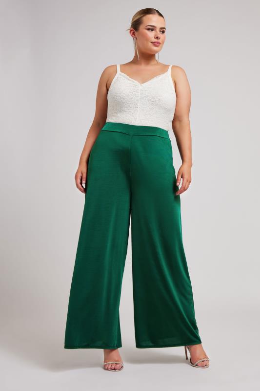 YOURS LONDON Plus Size Emerald Green Slinky Wide Leg Trousers | Yours Clothing 1