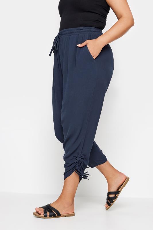 YOURS Plus Size Navy Blue Crinkle Ruched Cropped Trousers | Yours Clothing 1