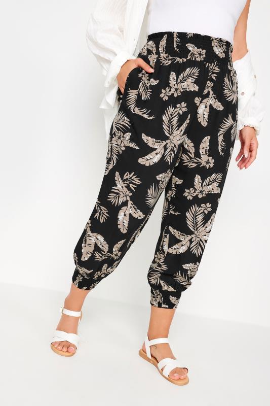 YOURS Plus Size Black Leaf Print Shirred Harem Trousers | Yours Clothing 1