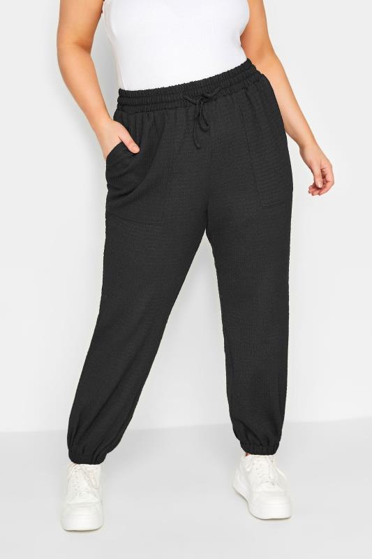 YOURS Plus Size Black Crinkle Cargo Joggers | Yours Clothing 1