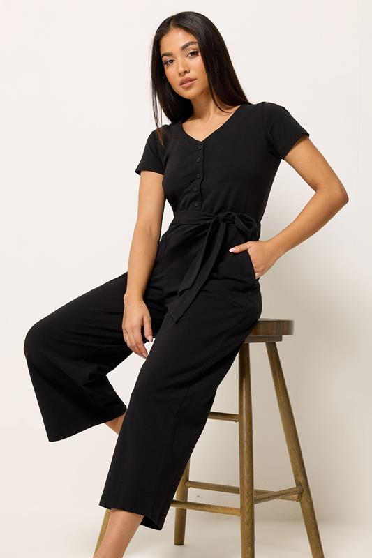 M&Co Petite Black Tie Waist Jumpsuit | M&Co 1