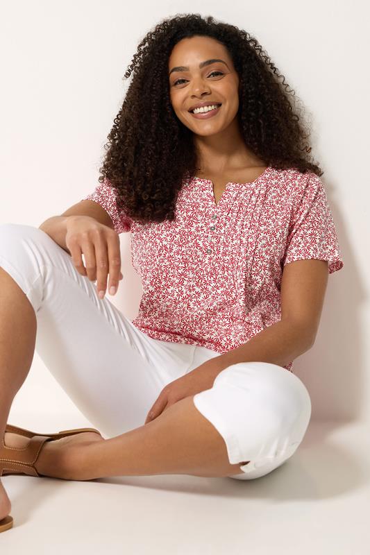 M&Co top henley floral rojo de algodón