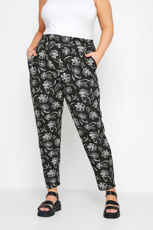 YOURS Plus Size Black Floral Print Double Pleat Harem Trousers | Yours Clothing 1
