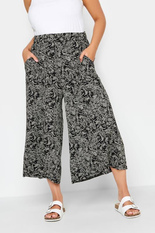YOURS Plus Size Black Ditsy Floral Print Midaxi Culottes | Yours Clothing 1