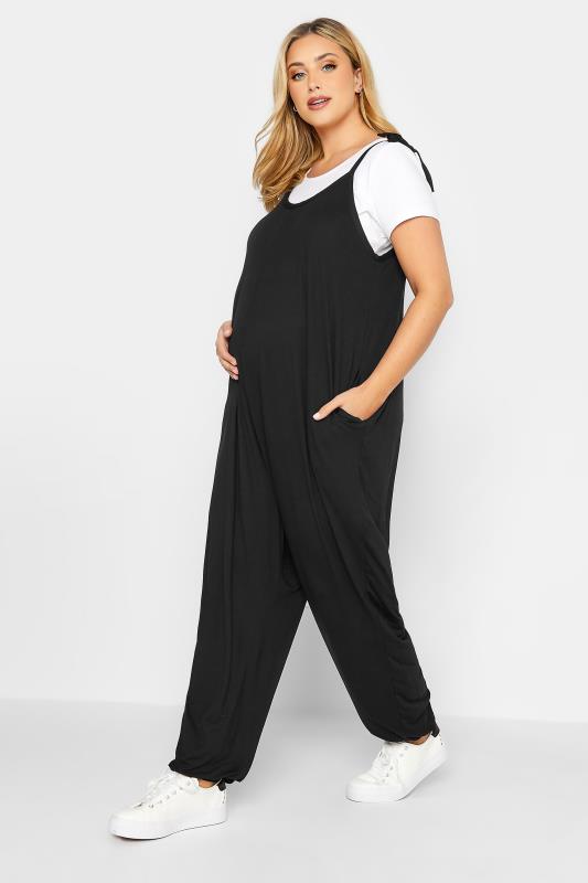 BUMP IT UP MATERNITY Plus Size Black Oversized Jumpsuit | Yours Clothing 1