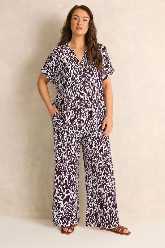 EVANS Plus Size Berry Red Ikat Print Shirred Waist Trousers | Evans 2